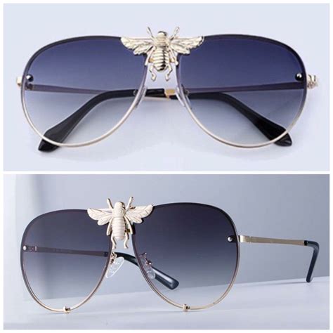 gucci glasses with the bee in the middle|Gucci bumblebee glasses.